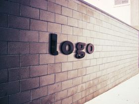 logo标志企业识背景墙砖墙大气