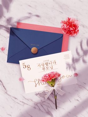 浪漫粉色系信封与祝福卡片