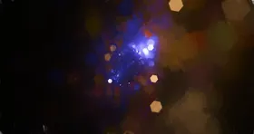炫彩粒子光线光效舞台背景虚化点晕梦幻星芒
