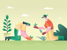 两人花园中愉快栽种花草